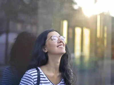 Smiling young lady outdoors